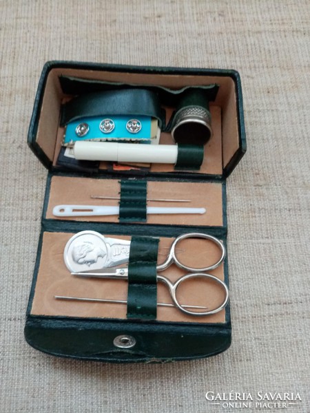 Retro travel sewing kit in leather case