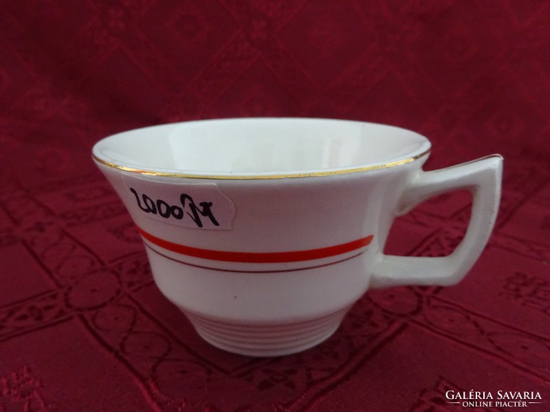 Granite Hungarian porcelain, red striped teacup. He has!