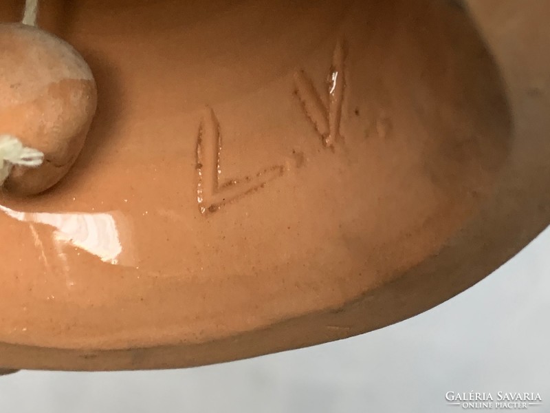 Marked lv monogram glazed shaped ceramic bell, bell