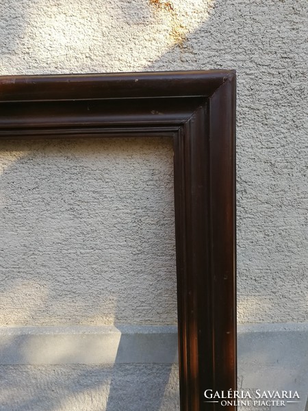 Huge wooden frame!! In dark wood color! The inner size is 103cmx123, 5cm fold size. Outer 121cm x141cm.