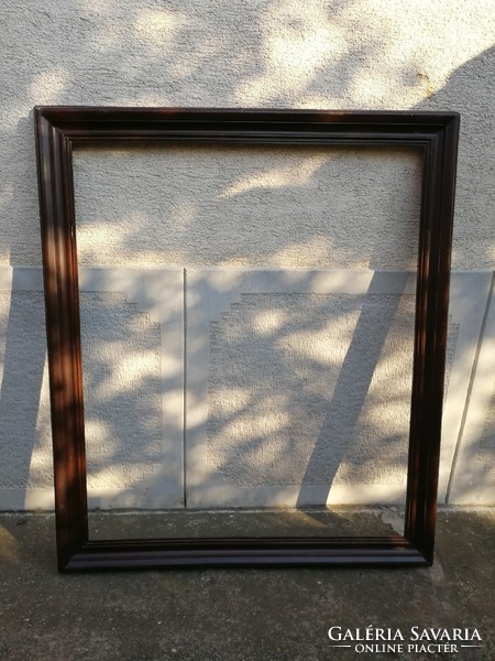 Huge wooden frame!! In dark wood color! The inner size is 103cmx123, 5cm fold size. Outer 121cm x141cm.