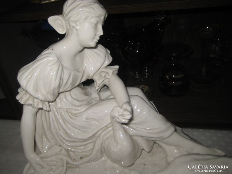 A porcelain girl stuffing a goose, a rare beautiful artefact, probably Bernard Bloch