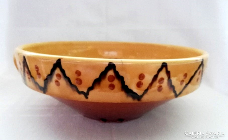 Marked, hand-painted old glazed tile bowl