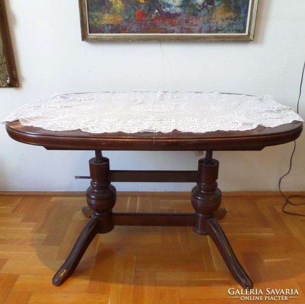 Practical, extendable oval neo-baroque table