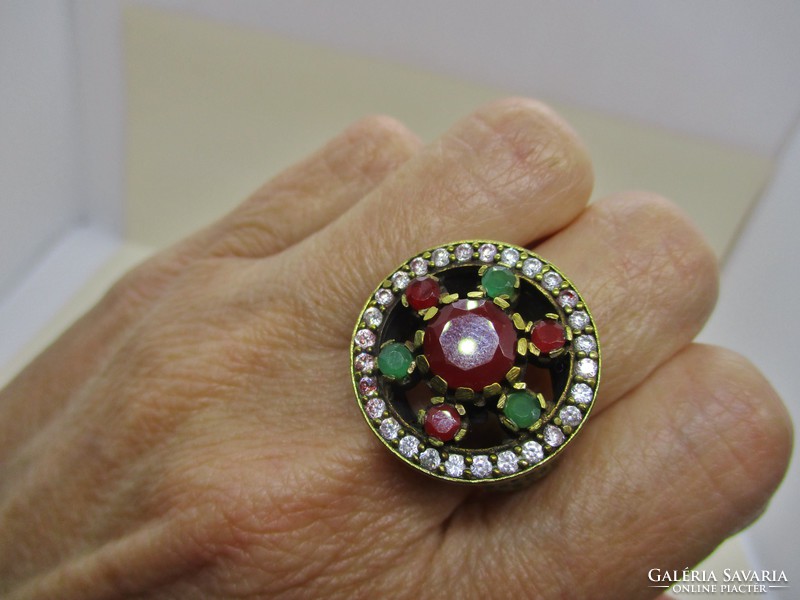 Beautiful large handmade old ring with ruby and emerald colored stones