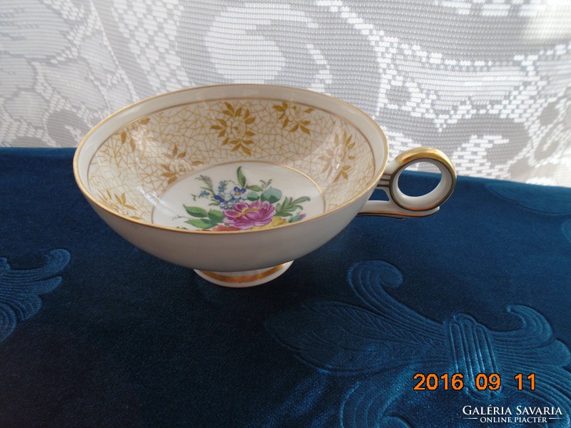 Spectacular hand-painted Meissen bouquet with schaubach kunst tea cup