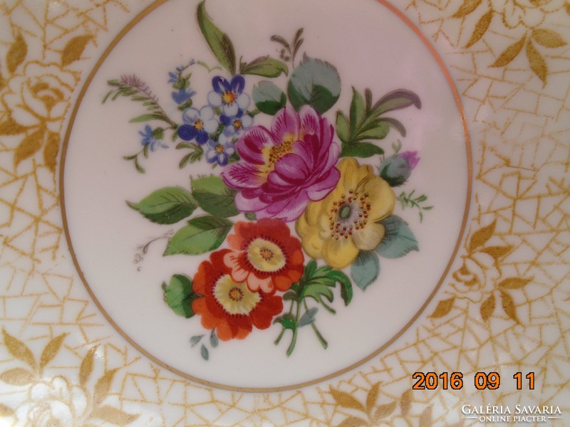 Spectacular hand-painted Meissen bouquet with schaubach kunst tea cup