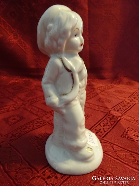 German porcelain figurine, walking boy, height 13 cm. He has!