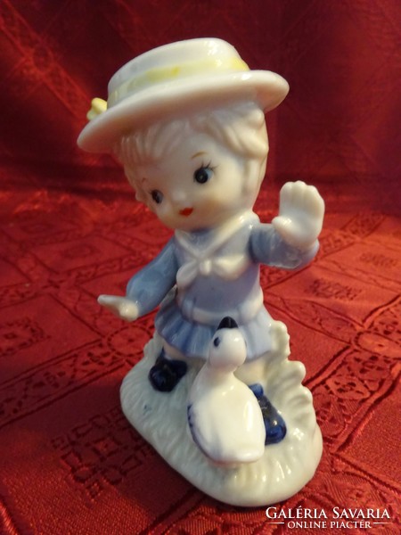 German porcelain figural statue, little girl with goose, height 10 cm. He has!