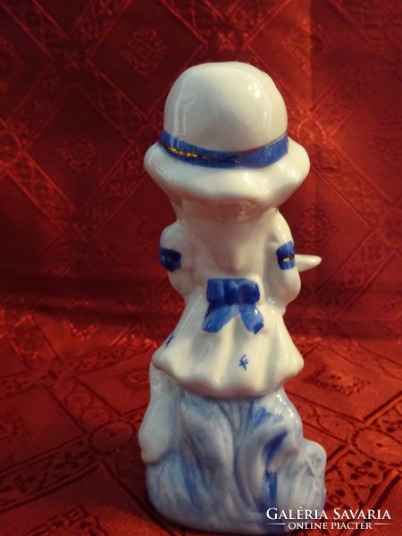 Oriental porcelain figural statue of a little girl with a dog and a pigeon. He has!