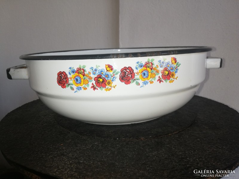 Enamel bowl with beautiful patterned flowers, nostalgic piece of rustic decoration