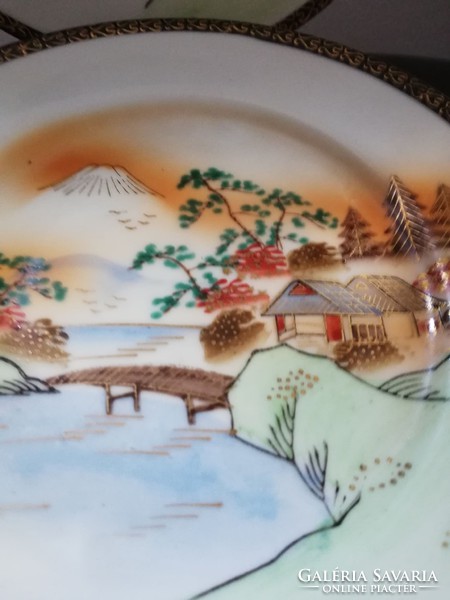 2 hand-painted oriental breakfast plates