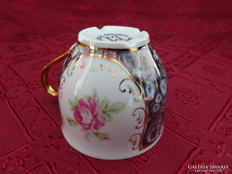 Czech porcelain, hand-painted, rose-patterned coffee cup. He has!