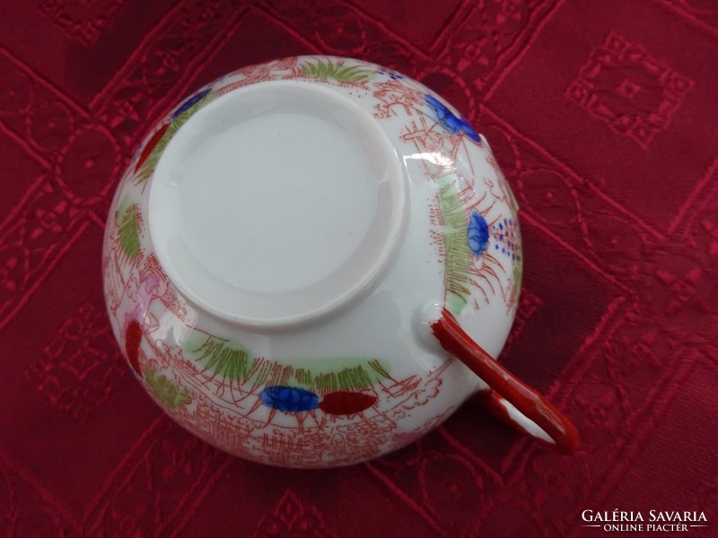Kézi festésű japán porcelán teáscsésze, kidomborodó gésa fej a csésze alján. Vanneki!