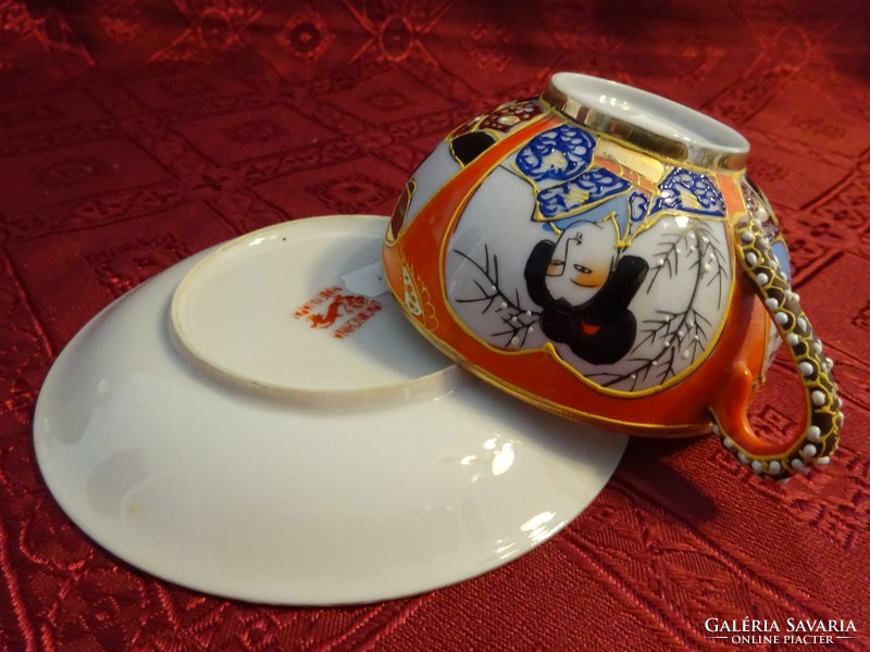 Japán porcelán teáscsésze + alátét. Gésa fej van a csésze aljában. Vanneki!