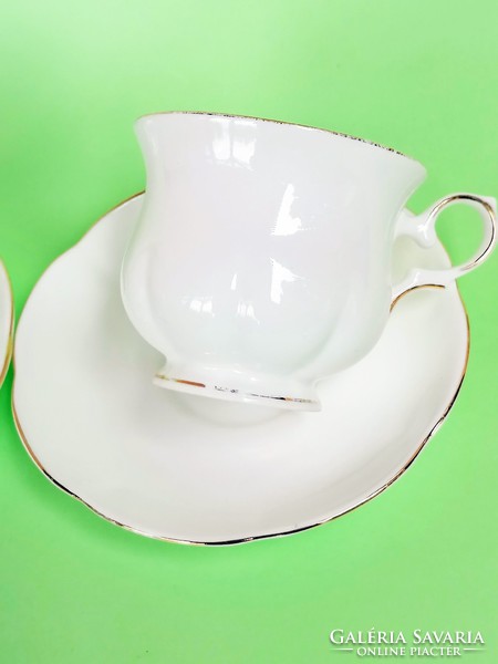 Pair of snow-white, English, elegant coffee cups
