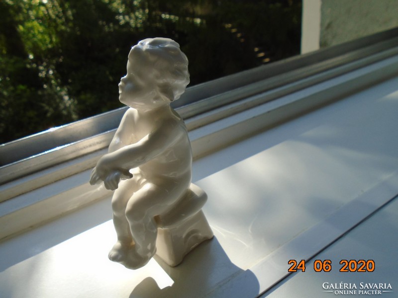 Antique numbered white glazed statue, 