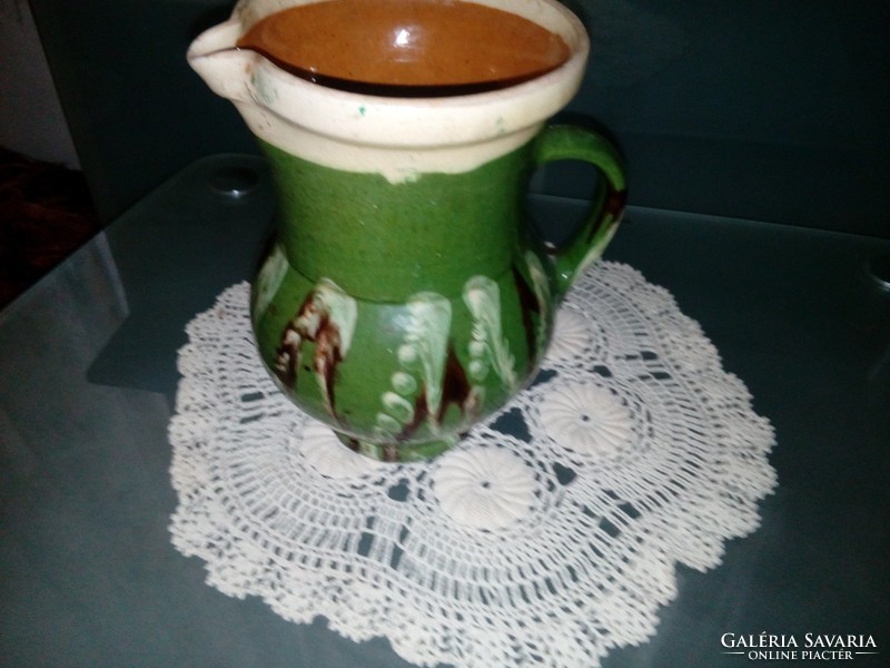 Old ceramic glazed jug