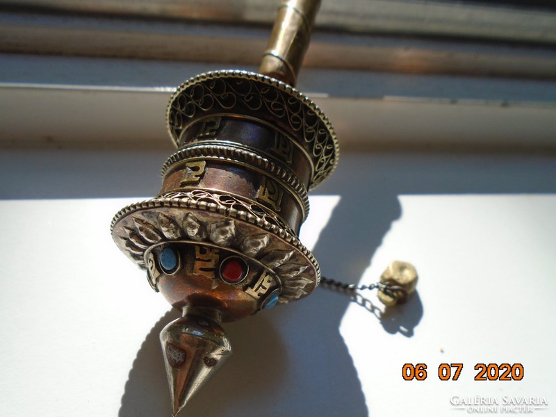 Older Tibetan Buddhist prayer wheel with semi-precious stones