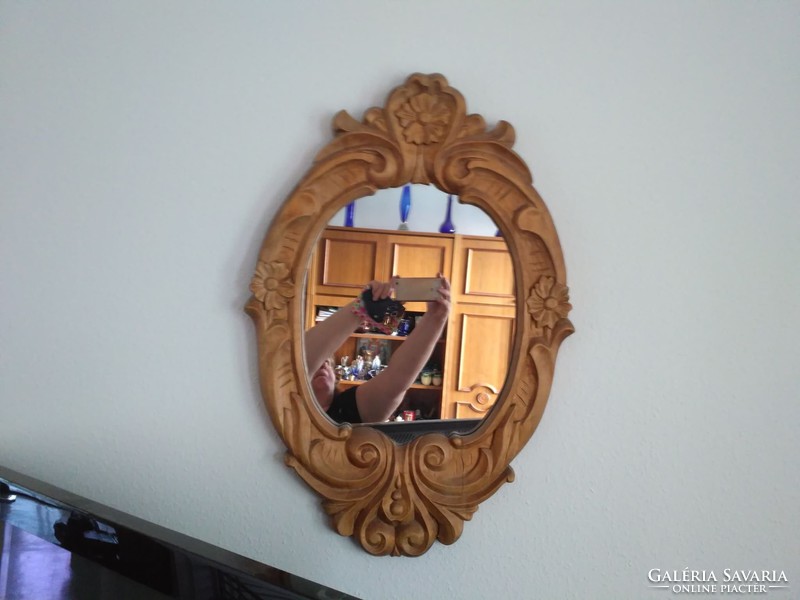 A wonderful carved large wooden mirror