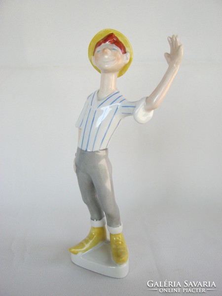 Boy waving porcelain in Drasche quarries