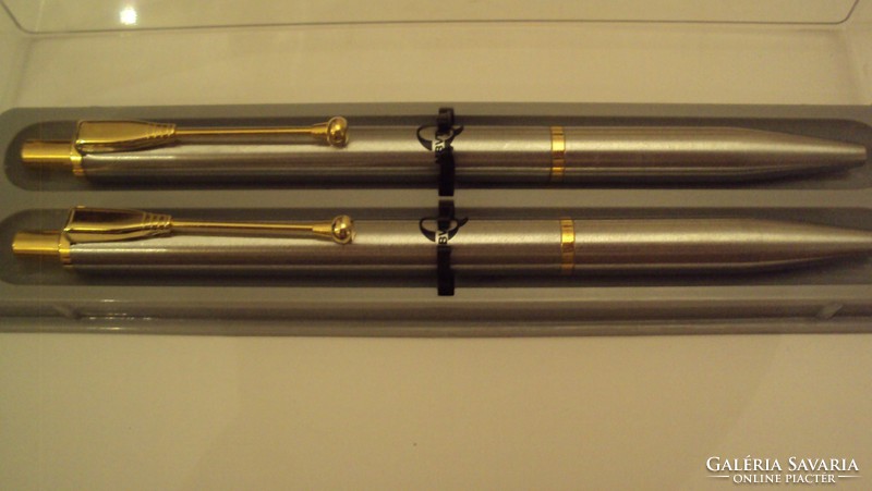 Finely designed matte silver pen set with gold clip--ballpoint pen + Rotring pencil, in its own box.