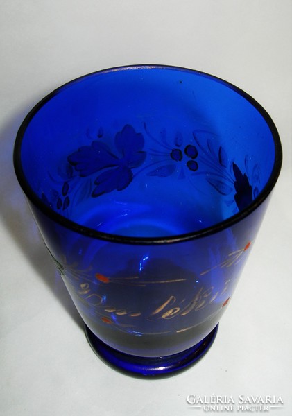Antique painted cobalt blue glass with the words 