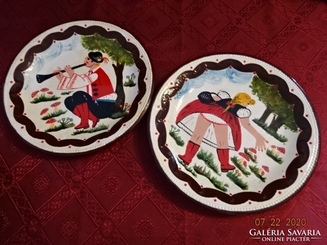 Granite porcelain wall decorative plate, spicy scene. The boy plays the flute, the girl picks mushrooms. He has!