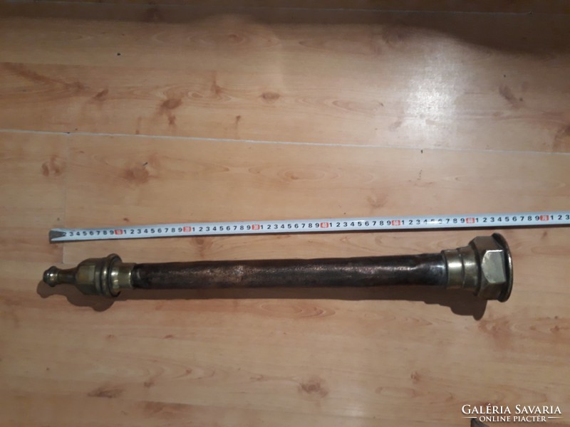 Old yellow and copper fire hose end (approx. 100 years old)