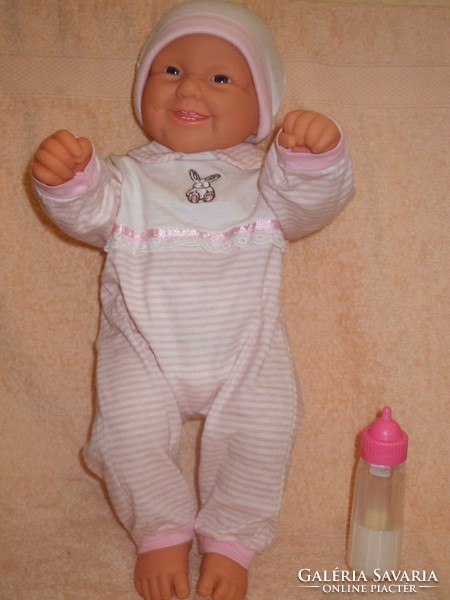 Rare lifelike baby girl with baby bottle..
