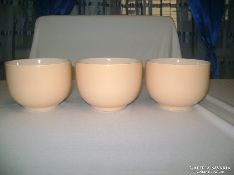 Three vintage soup cups together
