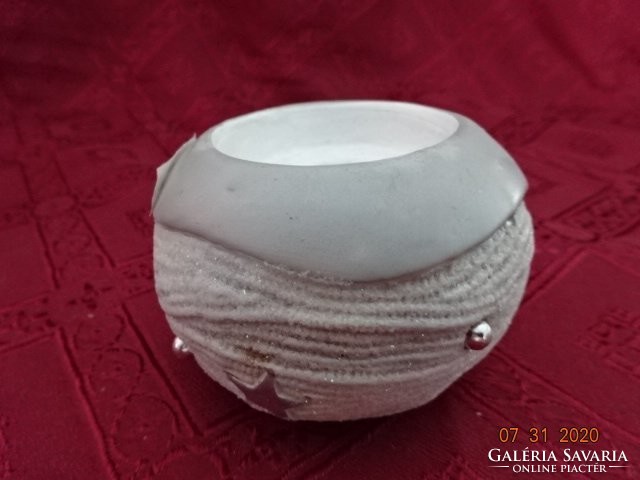 Porcelain candle holder, round, largest diameter 9 cm. He has!
