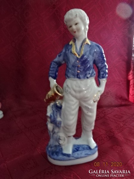 Porcelain figure, the water-carrying boy, height 23.5 cm. He has!