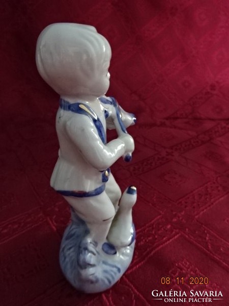 Porcelán figura, kisfiú a libával, magassága 13 cm. Vanneki!