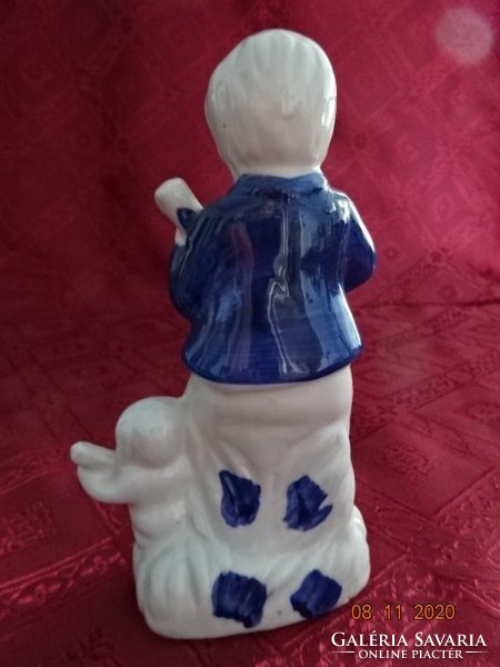 Porcelain figurine, a boy and his dog with a violin, height 15 cm. He has!