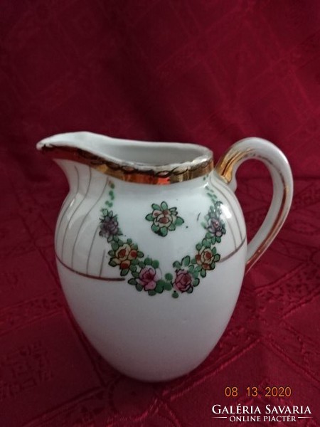 Japanese quality porcelain milk jug and small plate, hand painted. He has!