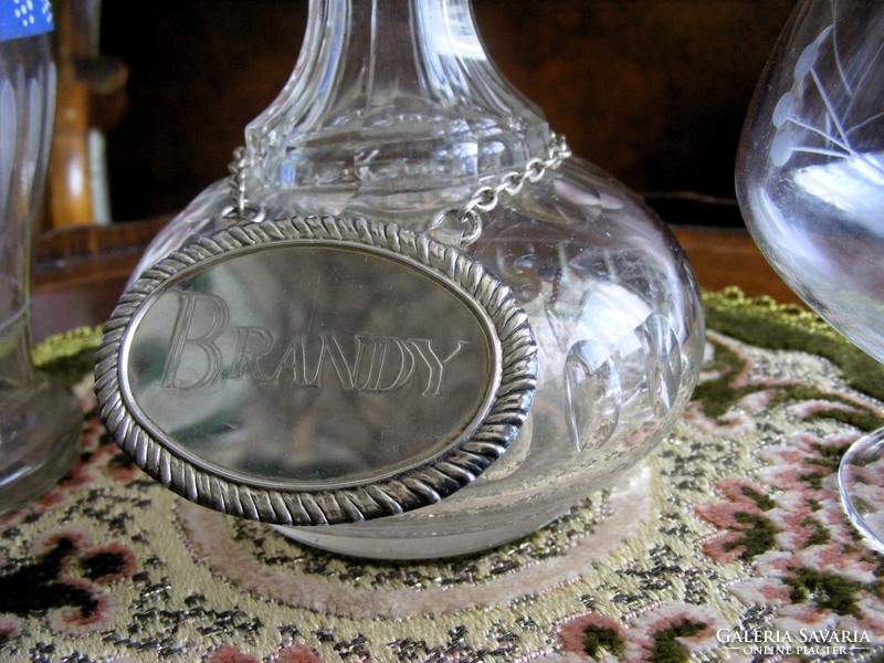 Antique, polished glass, crystal and painted beverage bottles, with silver-plated label, also in pieces