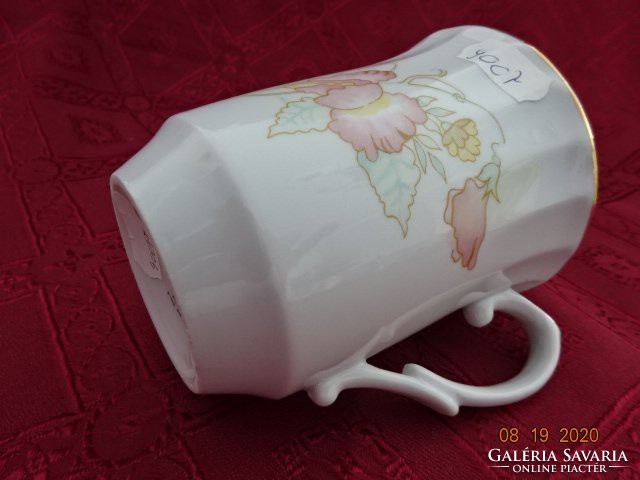 Apulum porcelain mug, unique shape with spring flower. Its diameter is 8.5 cm. He has!