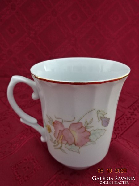 Apulum porcelain mug, unique shape with spring flower. Its diameter is 8.5 cm. He has!