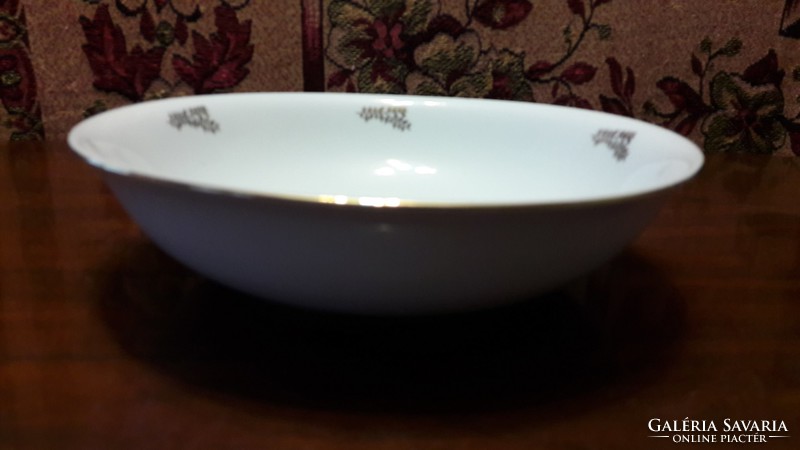 Porcelain garnished bowl 104.
