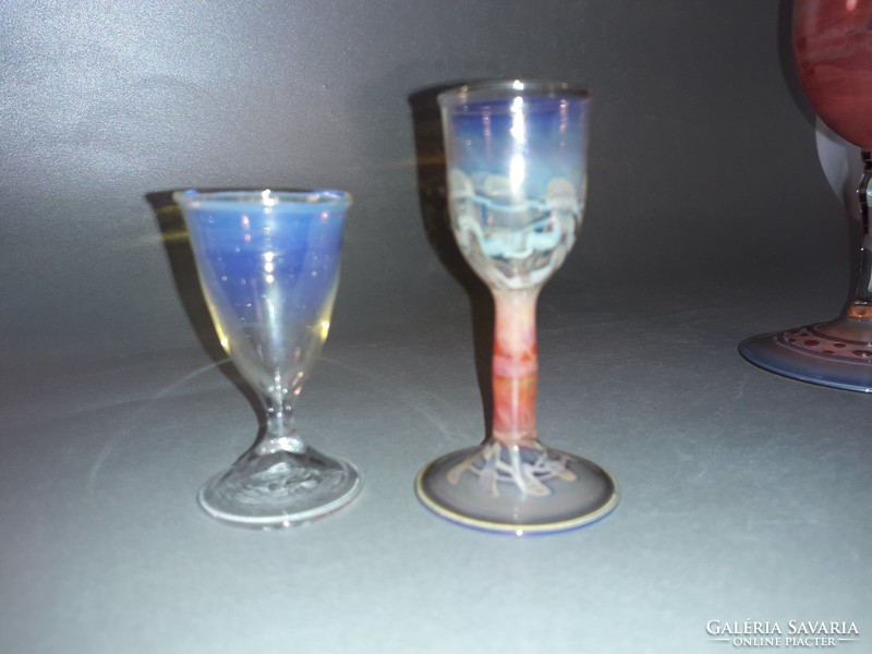 Handcrafted glass cups and flower sprinklers are excellent works of glass artist István Herczeg