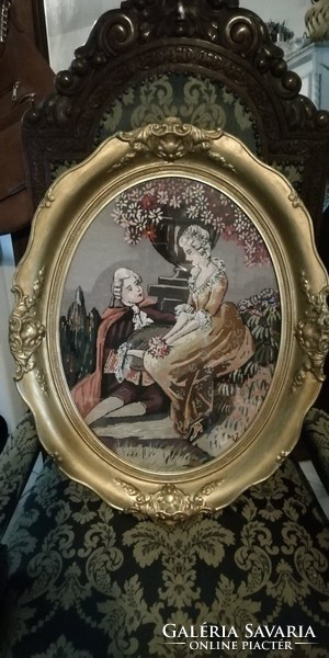 Large oval blond frame with baroque needle tapestry