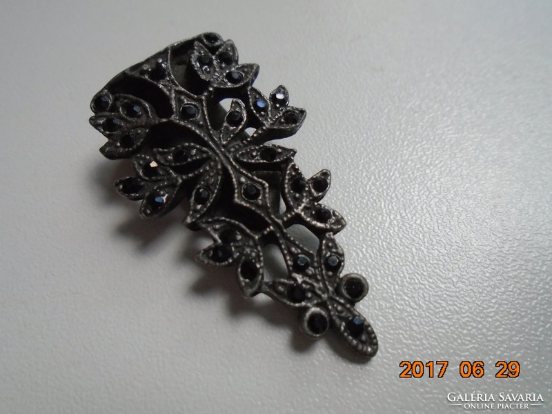 Antique goldsmith's work, pinched, openwork filigree flower pattern dress jewelry, with small black stones