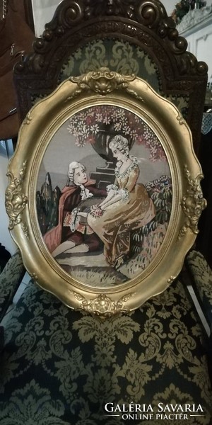 Large oval blond frame with baroque needle tapestry