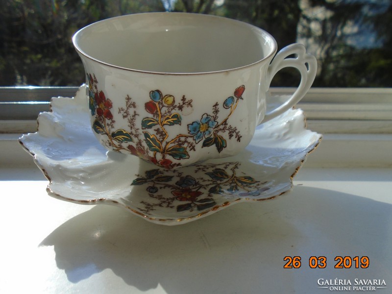 Imperial gold-contoured art nouveau mz austria teacup, with laced checkered coaster
