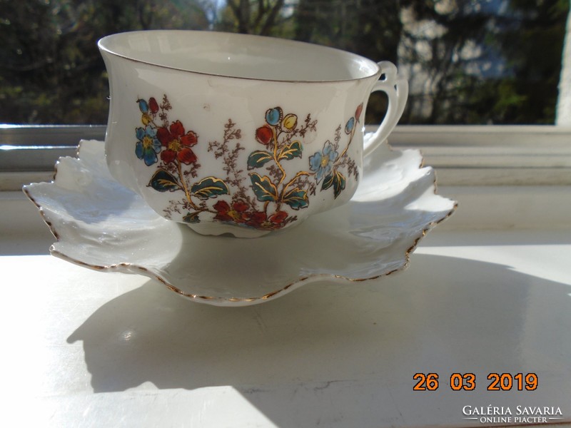 Imperial gold-contoured art nouveau mz austria teacup, with laced checkered coaster