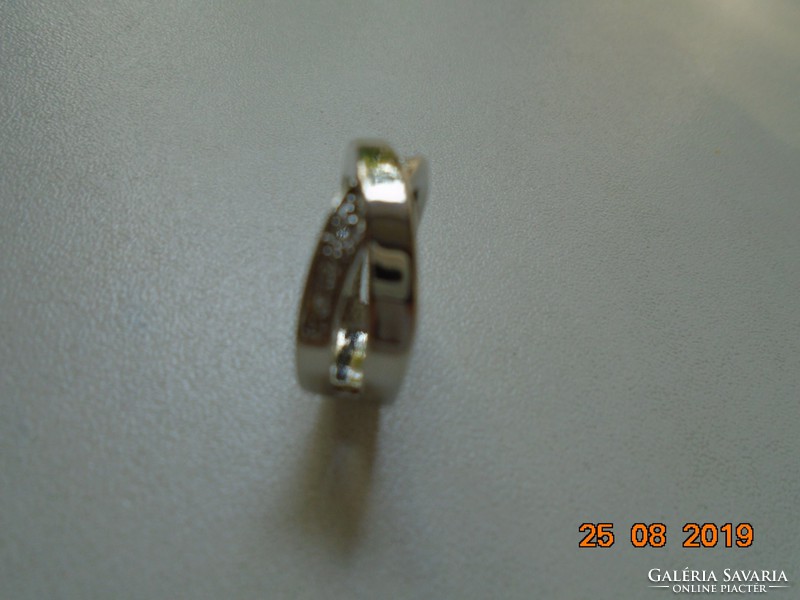 Modern stainless steel ring with wedged rhinestones and reliefs
