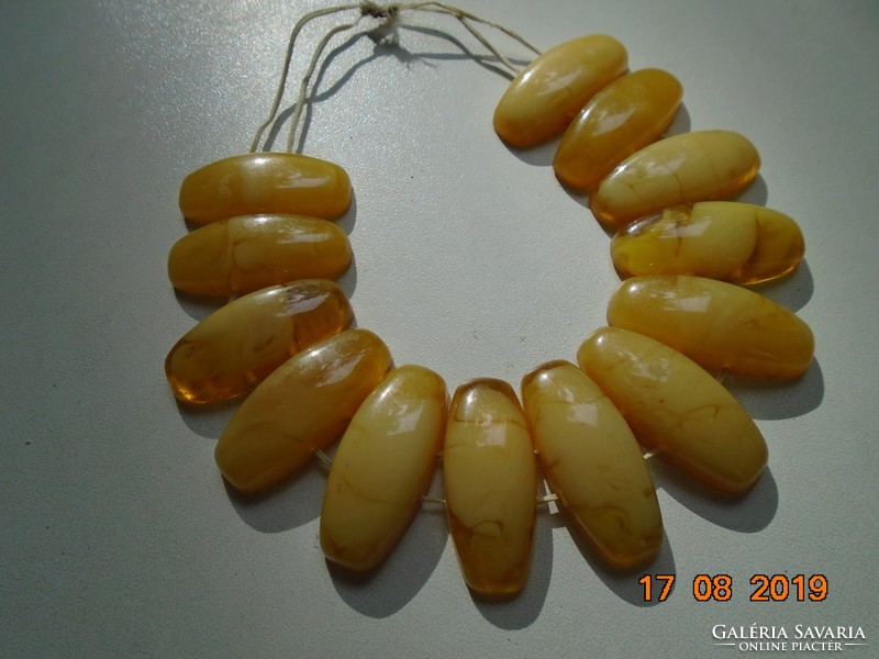 Old amber bracelet with large oval flat beads