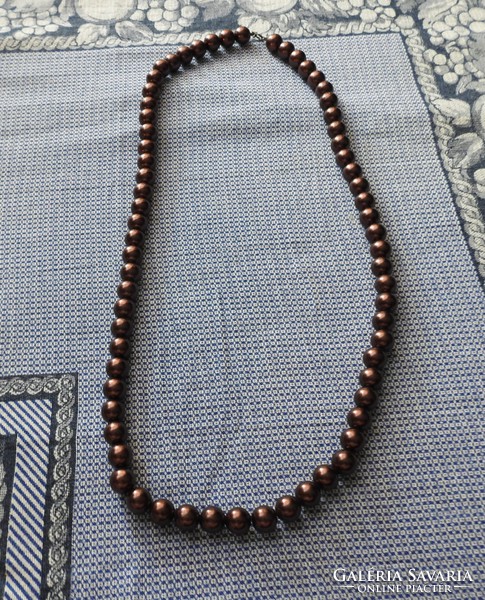 Brown old plastic string necklace