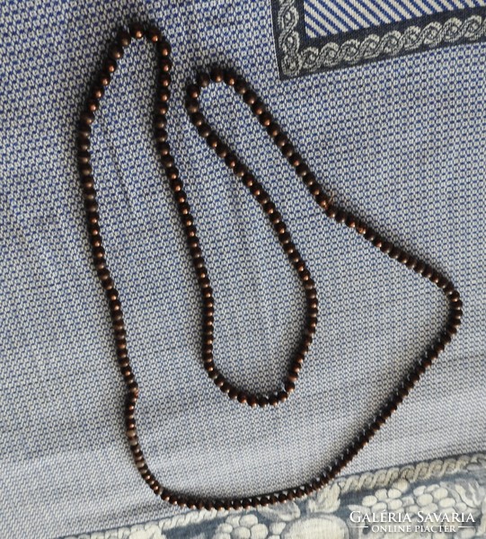Brown string necklace